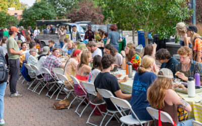 Students eating at a long table